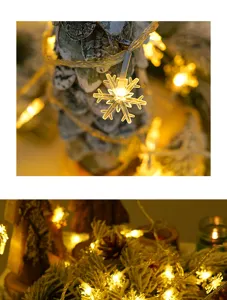 Nahaufnahme von warmweißen LED-Schneeflocken-Lichterketten für stimmungsvolle Weihnachtsdeko.