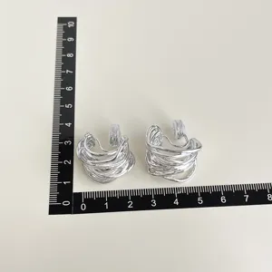 Silver multi-strand geometric clip-on earrings detail view, non-pierced daily wear.