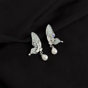 Silver butterfly pearl drop earrings, exquisite shiny crystal wing design for women.