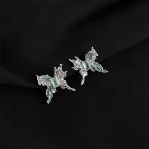 Chic butterfly clip-on earrings with green resin and sparkling rhinestones for women.