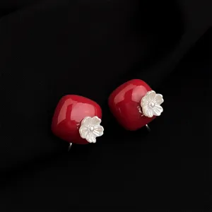 Red geometric drop oil earrings with white shell flower, elegant retro design for women.