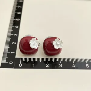 Chic burgundy square clip-on earrings with silver flower detail, non-pierced design.