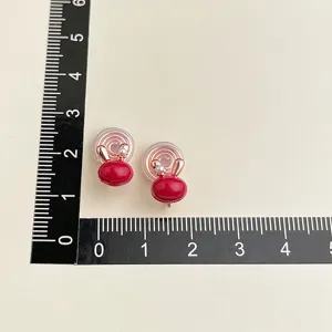 Cute red bunny ear clip-on earrings for women, non-piercing cute retro jewelry detail.