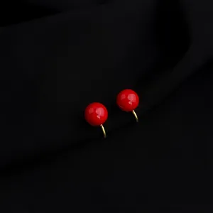 Wine red drip oil clip earrings detail, gold plated vintage non-pierced ear clip jewelry.