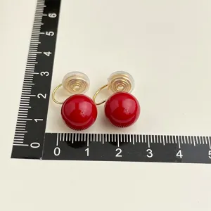 Red round bead clip-on earrings, non-pierced design with gold-plated finish for daily wear.