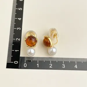 Gold plated clip-on earrings with wine red amber and white pearl for non pierced ears.