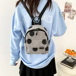 Cute vintage corduroy mini backpack, trendy polka dot casual daypack, main product view.