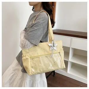 Borsa shopper coreana con stampa di stelle, tasca frontale trasparente e ciondolo stella.