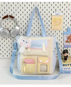 Bolso de hombro para estudiantes de lona de estilo japonés con múltiples bolsillos y gran capacidad.
