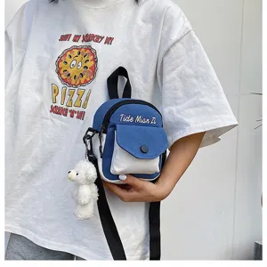 Casual canvas crossbody bag for women, stylish small shoulder bag with cute bear pendant.