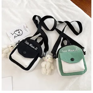 Canvas crossbody bag for women, cute small shoulder bag with cute bear pendant and stylish letter embroidery.
