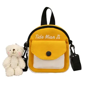 Small canvas crossbody backpack for women cute casual yellow bag with bear pendant