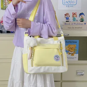 Sac cabas en toile blanc et jaune, grand sac porté épaule élégant pour style étudiant.