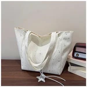 Canvas tote bag with silver star print, large capacity and stylish design.