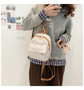 Floral print mini backpack, sweet style cute student daily lightweight casual bag detail view.
