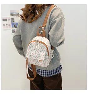 Small floral mini backpack for women, cute sweet style student casual lightweight daypack detail.