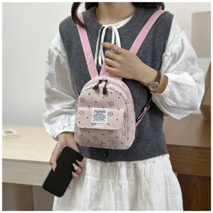Pink floral corduroy mini backpack for women and kids casual travel small daypack detail view