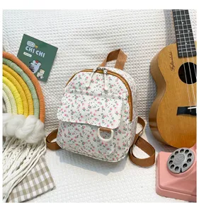 Small floral mini backpack for women, sweet style sweet floral print with brown straps.
