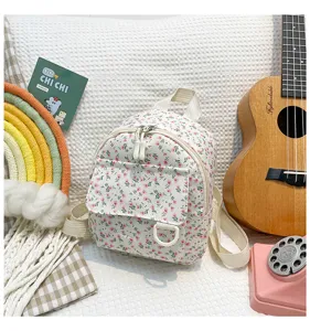 Small floral print backpack for women, sweet cute school bag, lightweight casual daypack.