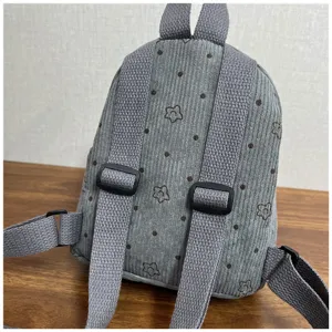 Corduroy mini backpack with cute floral pattern, detailed back view, casual daily use.