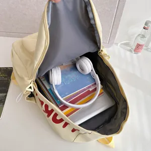Large capacity canvas backpack for students, stylish Japanese style school bag with laptop