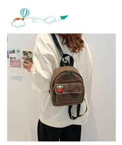 Brown corduroy mini backpack with strawberry print, ideal for school and daily casual travel.
