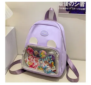 Zaino ita bag viola con orecchie d'orso e tasca in rete trasparente per spille anime.