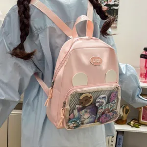 Zaino rosa con tasca frontale trasparente per spille anime, borsa carina per ragazze.