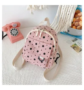 Mini rosa Kord Rucksack mit schwarzem Blumenmuster, süßer Freizeit-Tagesrucksack.