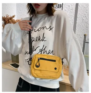Borsa a tracolla casual in tela da donna, piccola borsa a spalla con tasca frontale con zip.