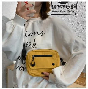 Borsa a tracolla in tela gialla da donna, borsa casual con tasca frontale con zip.