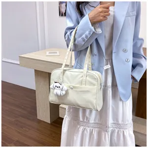 Casual large capacity canvas shoulder bag for women commuting travel underarm tote handbag detail view