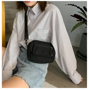 Borsa a tracolla casual in tela nera da donna, piccola borsa messenger alla moda.