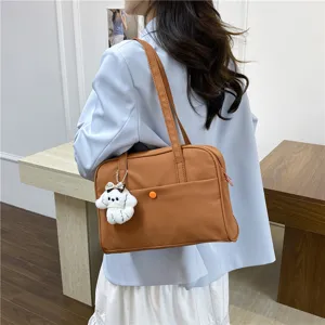 Casual brown shoulder laptop bag large capacity commuter handbag for women, main view display.