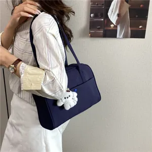 Casual large capacity shoulder tote bag for women daily commute travel solid color handbag.