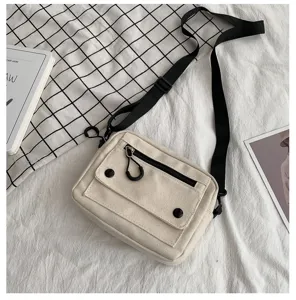 Borsa a tracolla casual in tela da donna, elegante borsa a spalla con tasca frontale e cinturino.