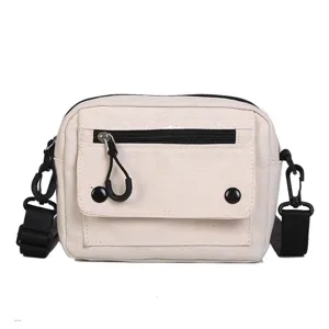 Borsa a tracolla casual in tela da donna, pratica borsetta da studentessa per uso quotidiano.