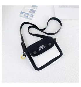 Contrast color canvas crossbody bag detail shot, compact shoulder bag with front flap pocket.