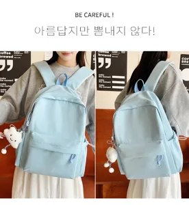 Simple light blue canvas school backpack for students, stylish daily casual casual daypack.