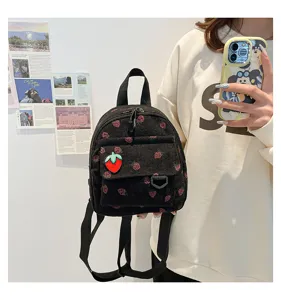 Corduroy mini backpack featuring cute strawberry print and adorable patch for daily casual wear.