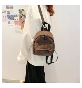 Cute brown corduroy mini backpack for women, vintage strawberry print casual daily school bag.