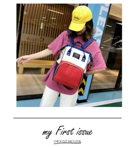 Detail view of the multi-functional waterproof mommy backpack in stylish color-block design.