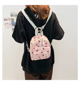 Sweet strawberry print corduroy mini backpack for girls, cute college style school bag.