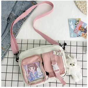 Sac bandoulière en toile mignon avec sangle rose, poche transparente et pendentif ours.