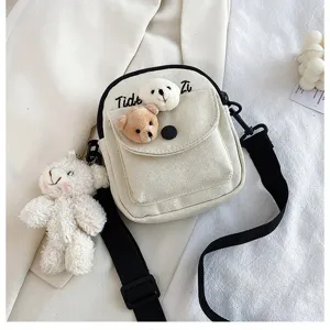 Canvas crossbody bag for women, cute bear pendant design, casual fashion daily shoulder bag.