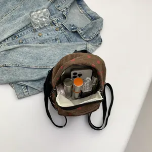 Brown corduroy mini backpack with cute red strawberry print, casual college style daily daypack.