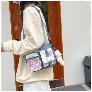 Sac bandoulière en toile tendance pour femmes, sac d'étudiant chic avec poche transparente.