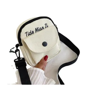 Canvas crossbody bag for women, trendy letter embroidered small shoulder bag, chic daily use.