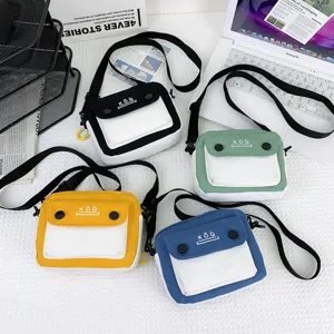 Stylish canvas crossbody bag for women, color block design with small front pocket and shoulder strap.