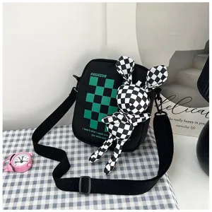 Fashion checkered canvas shoulder bag with cute rabbit pendant for casual student daily use.